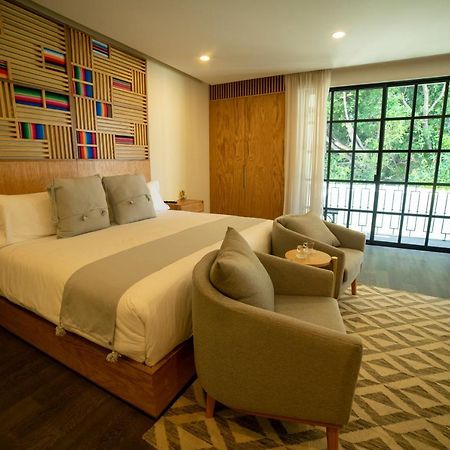 Hotel Dex ทลาคิวปาก ภายนอก รูปภาพ