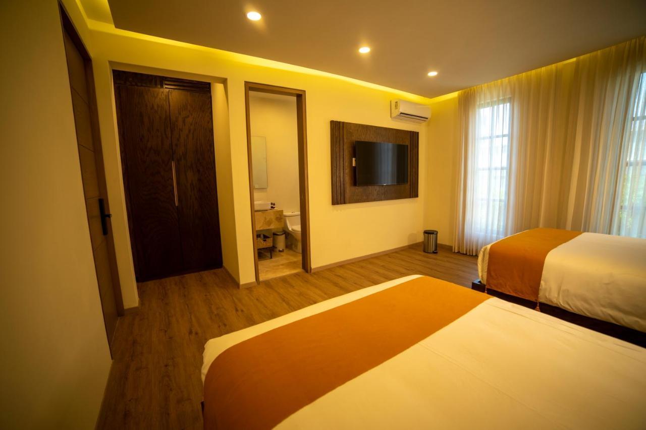 Hotel Dex ทลาคิวปาก ภายนอก รูปภาพ